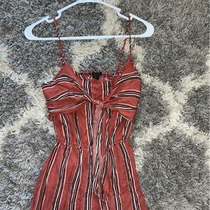 Red and black romper with red and black stripes